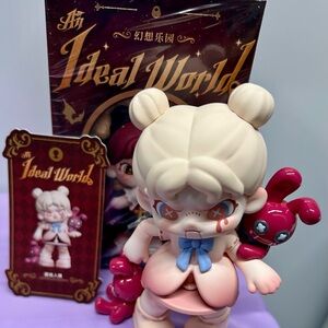 Dora An Ideal World Collectible Figure with Red Accents